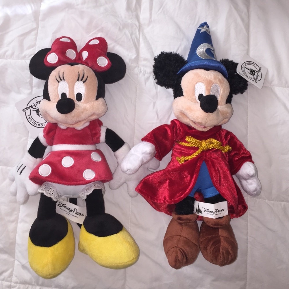 Authentic Mickey and Minnie plush dolls